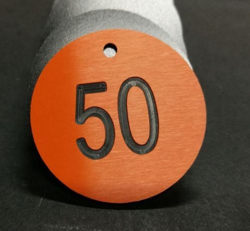50 Fichas numeradas del 1 al 50 en Naranja/negro